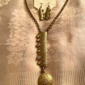 Goldtone Necklace and Earings are  in the original packaging